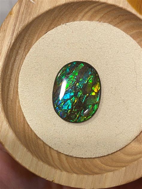 班彩缧|斑彩石(Ammolite)產品及功效介紹